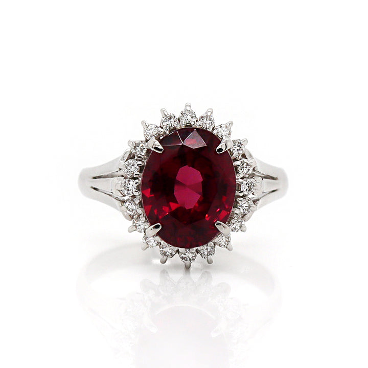 Platinum PT900 Garnet And Diamond Dress Ring