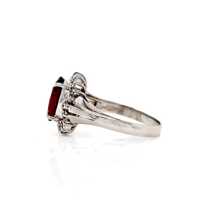 Platinum PT900 Garnet And Diamond Dress Ring