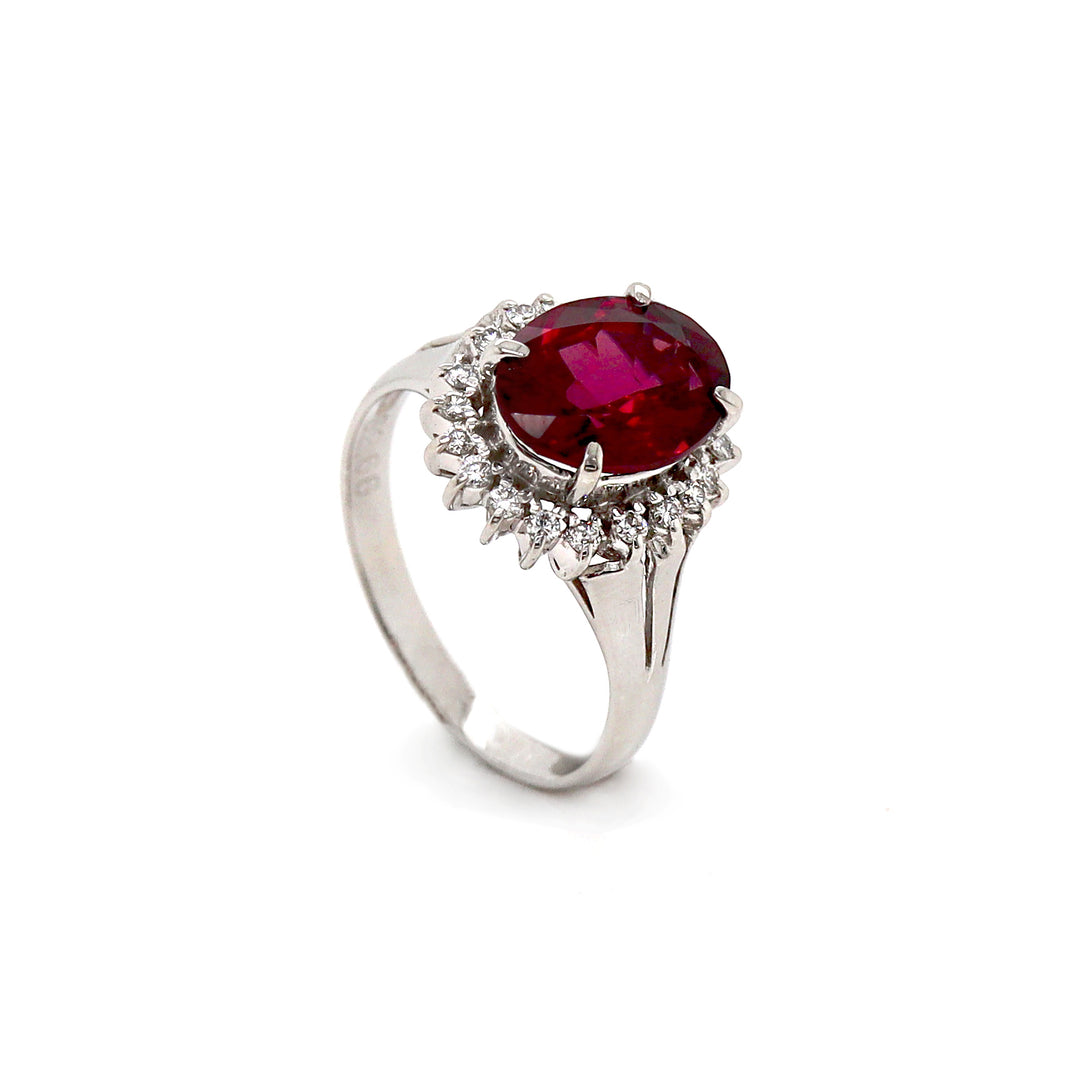 Platinum PT900 Garnet And Diamond Dress Ring